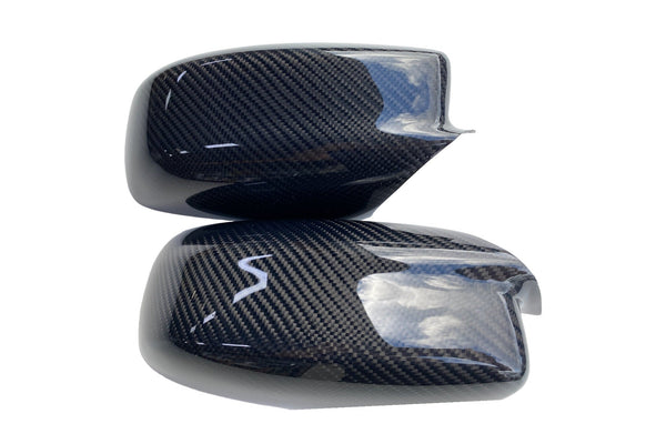 Glossy carbon fiber side mirror covers for Dodge Charger Widebody, Slim Body, and Chrysler 300, showing left and right mirror housing shapes.