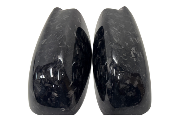 Top view of forged carbon fiber side mirror covers for 2015–2023 Dodge Charger and 2011–2023 Chrysler 300, highlighting the distinctive forged carbon pattern.